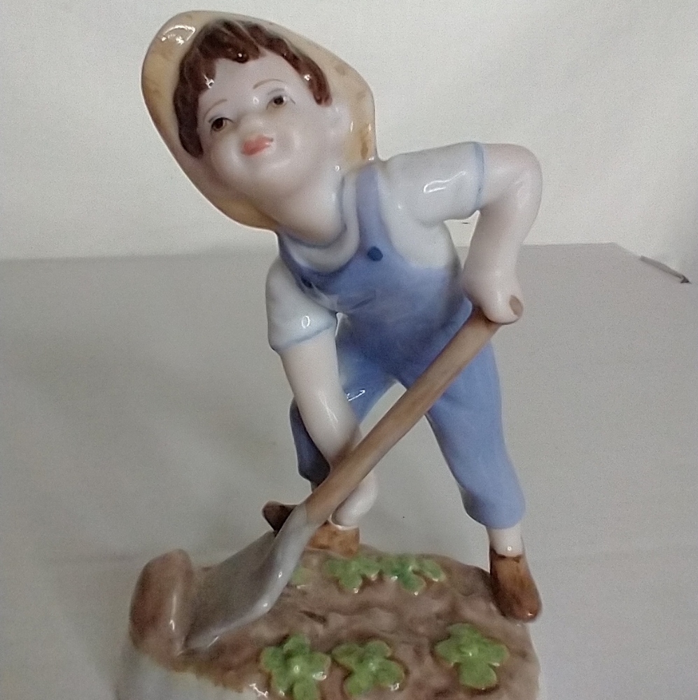 Royal Worcester Saturday's Child boy figurine.